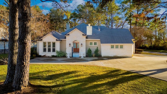 view of front of home with a front yard