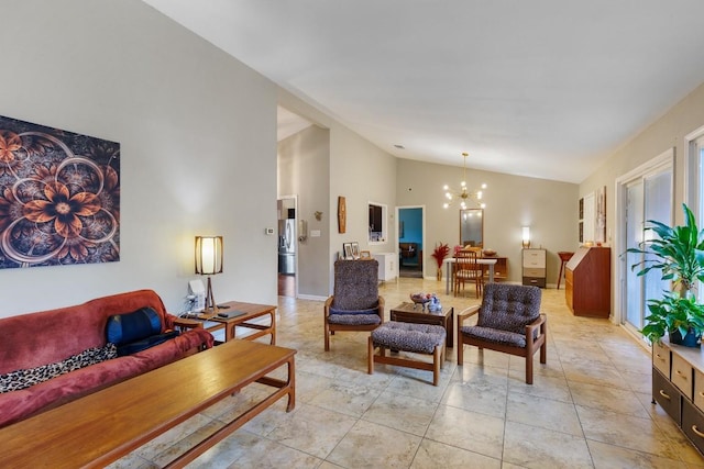 tiled living room with an inviting chandelier and high vaulted ceiling