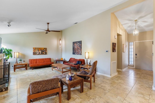 tiled living room featuring vaulted ceiling and ceiling fan