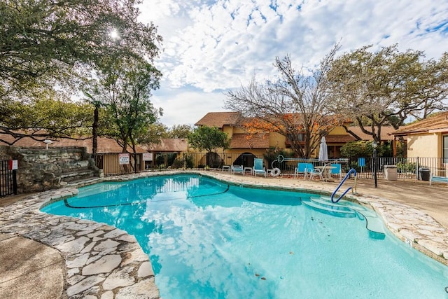 view of pool with a patio