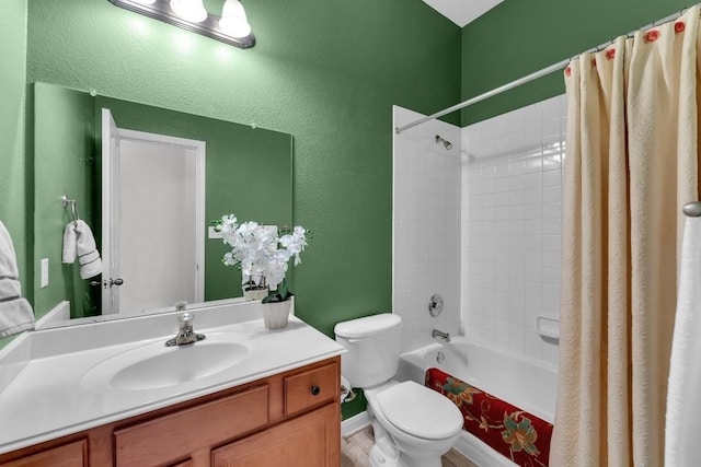 full bathroom featuring vanity, shower / bathtub combination with curtain, and toilet