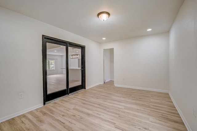 empty room featuring light hardwood / wood-style floors