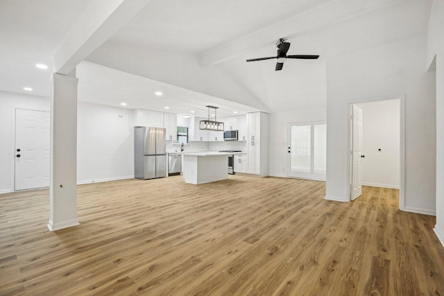 6009 Glen Meadow Dr, Austin, TX 78745 - unfurnished living room with light wood-style flooring, recessed lighting, and ceiling fan