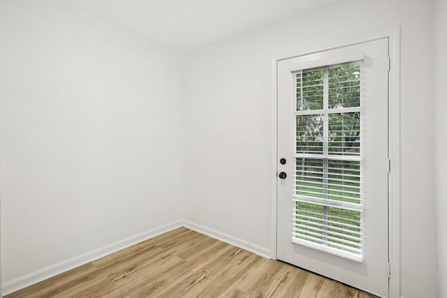 6009 Glen Meadow Dr, Austin, TX 78745 - entryway with light wood-type flooring and baseboards