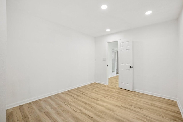6009 Glen Meadow Dr, Austin, TX 78745 - unfurnished room featuring recessed lighting and light wood finished floors