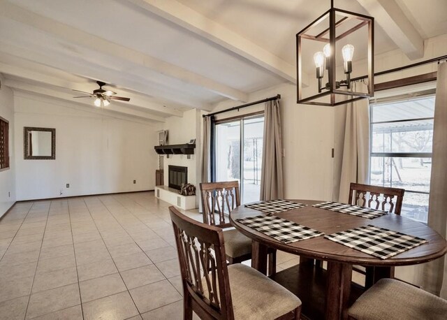 dining area featuring ceiling fan with notable chandelier, vaulted ceiling with beams, and light tile patterned floors