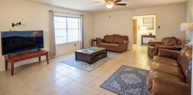 living room featuring light tile patterned flooring and ceiling fan