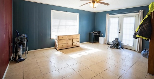 interior space featuring french doors and ceiling fan