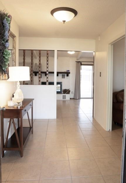 corridor featuring tile patterned floors