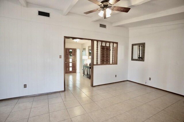 unfurnished room with light tile patterned flooring, ceiling fan, and beam ceiling