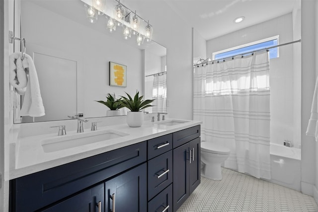 bathroom featuring double vanity, shower / bath combination with curtain, toilet, and a sink