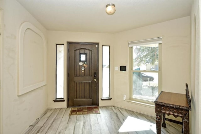 entrance foyer featuring light hardwood / wood-style floors