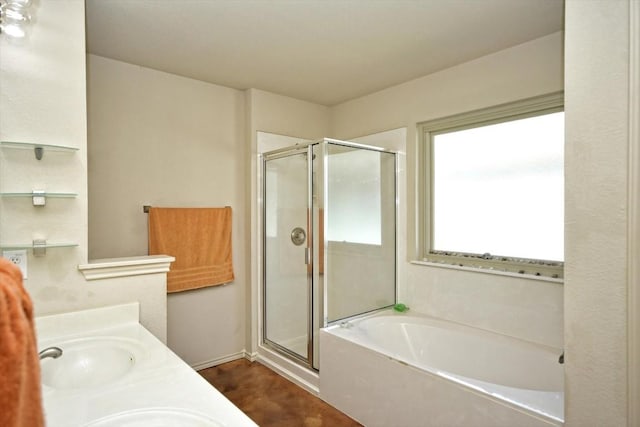 bathroom featuring vanity and plus walk in shower