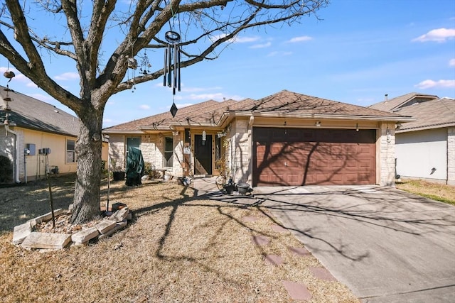 ranch-style house featuring a garage