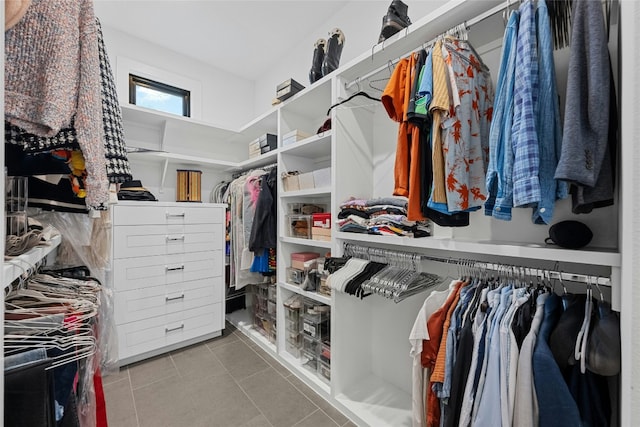 spacious closet featuring tile patterned flooring