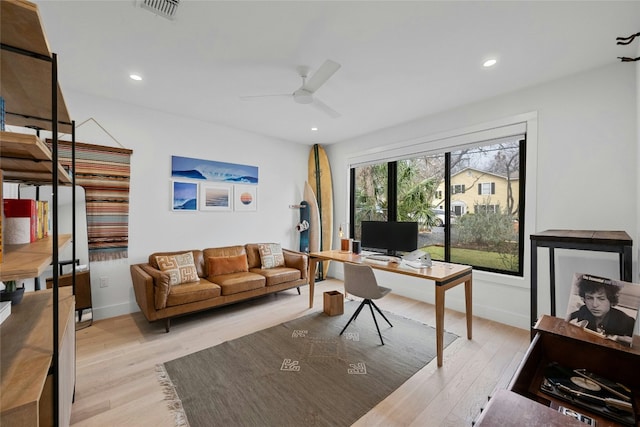 office featuring light hardwood / wood-style flooring and ceiling fan