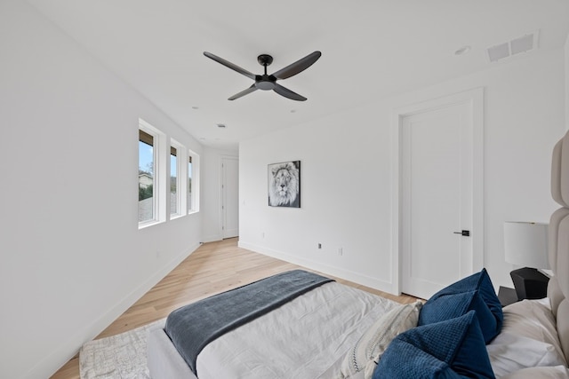 bedroom featuring ceiling fan and light wood-type flooring