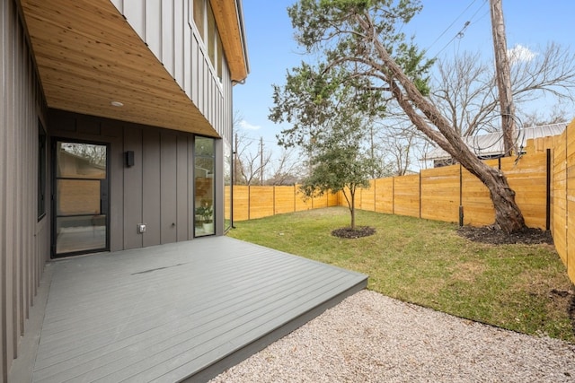 view of yard featuring a wooden deck