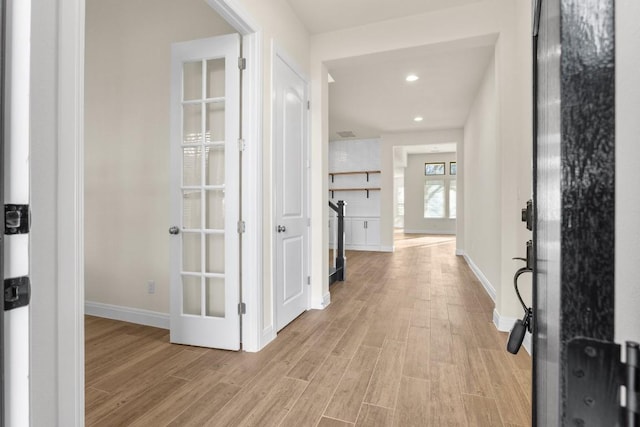 hall featuring light hardwood / wood-style flooring