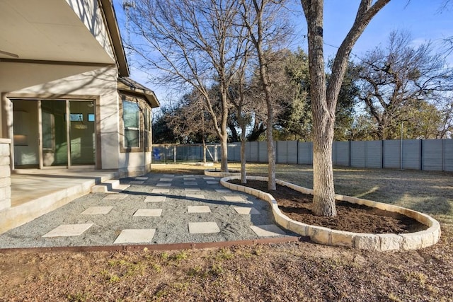 view of yard featuring a patio