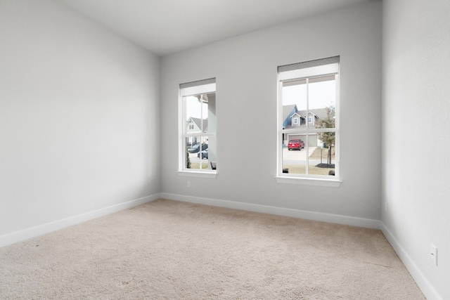 spare room featuring carpet flooring