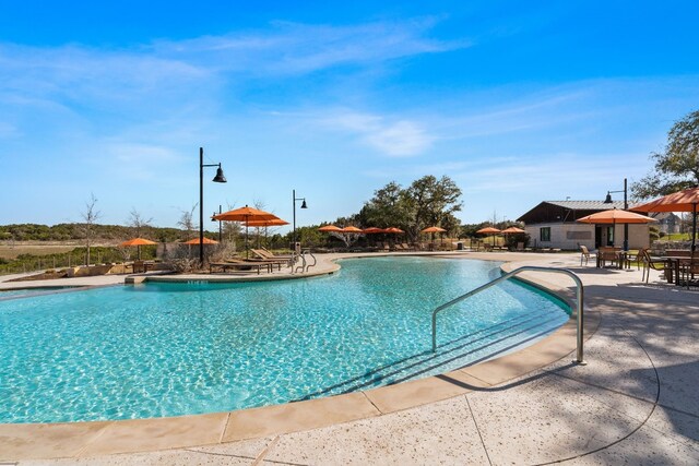 view of pool with a patio