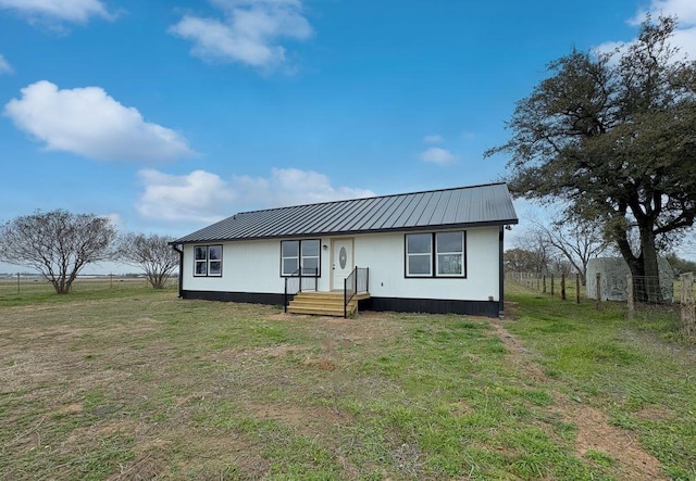 view of front of house with a front lawn