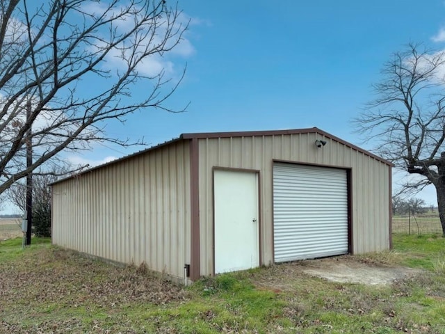 view of outbuilding with a garage