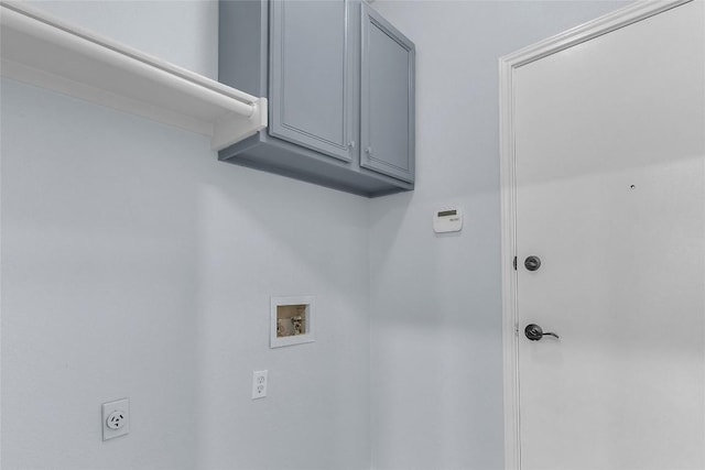 laundry area featuring cabinets, hookup for an electric dryer, and hookup for a washing machine