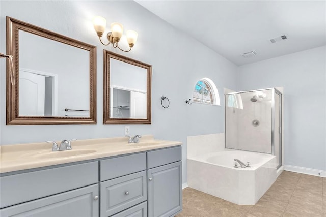 bathroom with vanity, tile patterned floors, and plus walk in shower