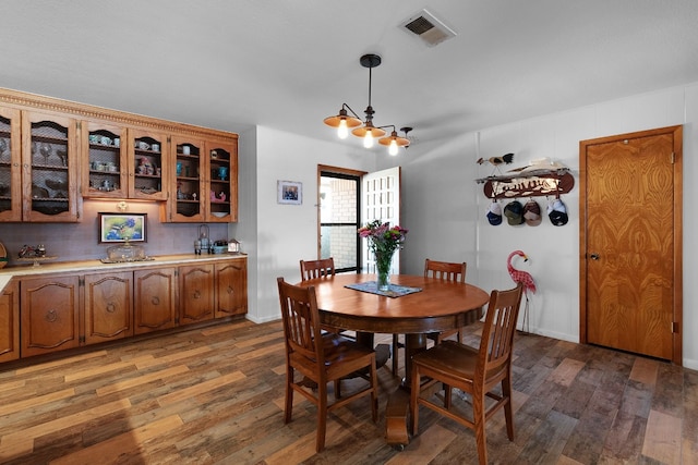 dining room featuring hardwood / wood-style flooring