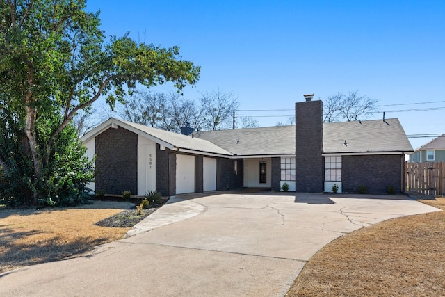 ranch-style home with a garage