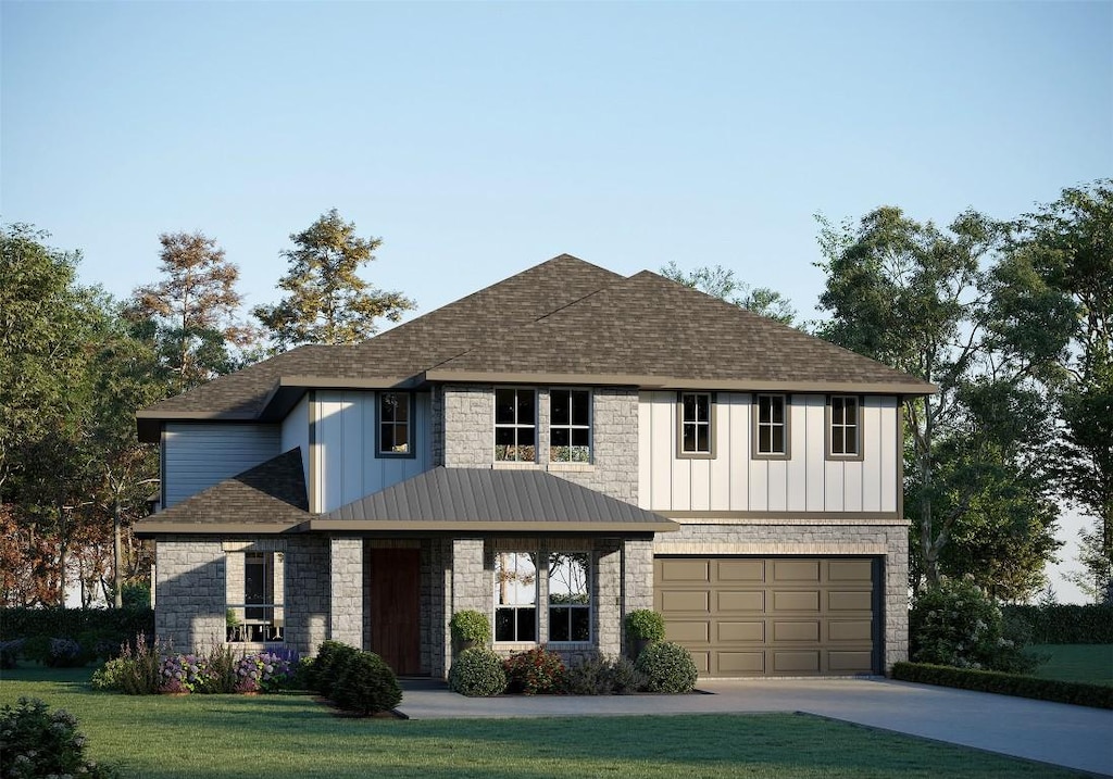 view of front facade with a garage and a front yard