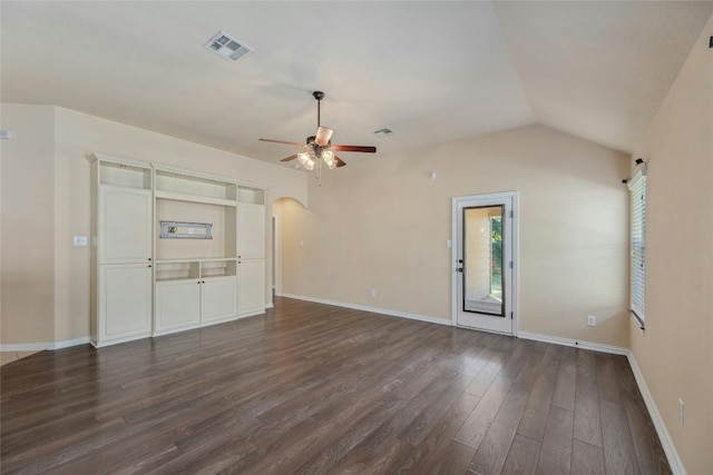 unfurnished living room with ceiling fan, vaulted ceiling, and dark hardwood / wood-style flooring