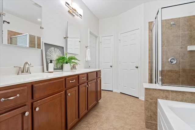 bathroom featuring vanity, tile patterned floors, and independent shower and bath