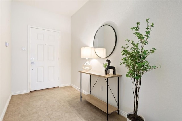 foyer entrance featuring light tile patterned floors