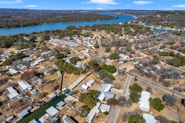 drone / aerial view with a water view