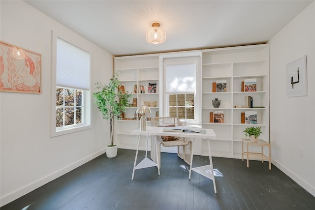 office with dark hardwood / wood-style floors