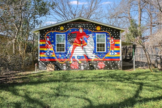 view of home's exterior with a lawn