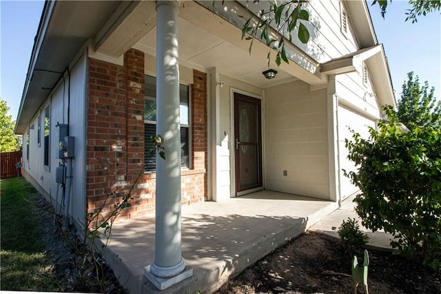 view of exterior entry featuring a garage