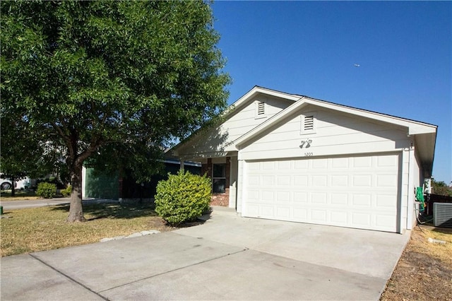 ranch-style house featuring a garage