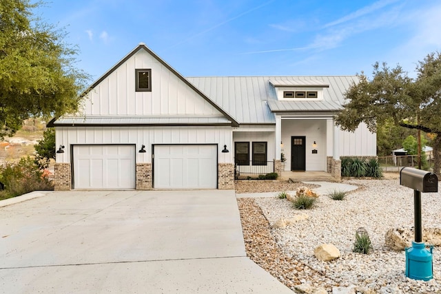 view of front facade with a garage and a porch