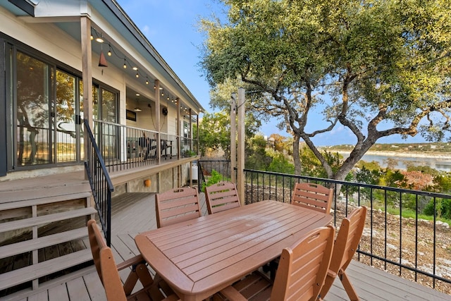 deck featuring a water view