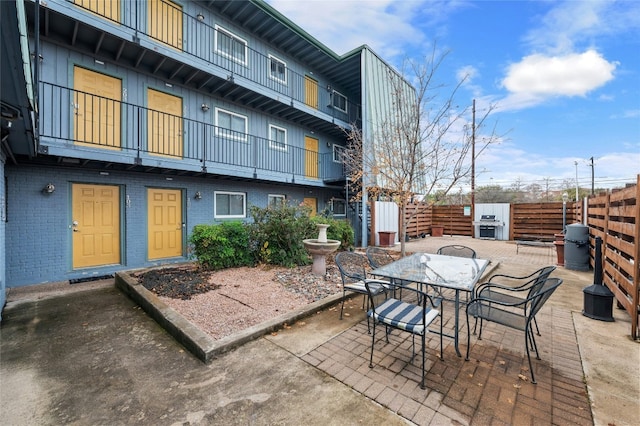 view of patio with fence