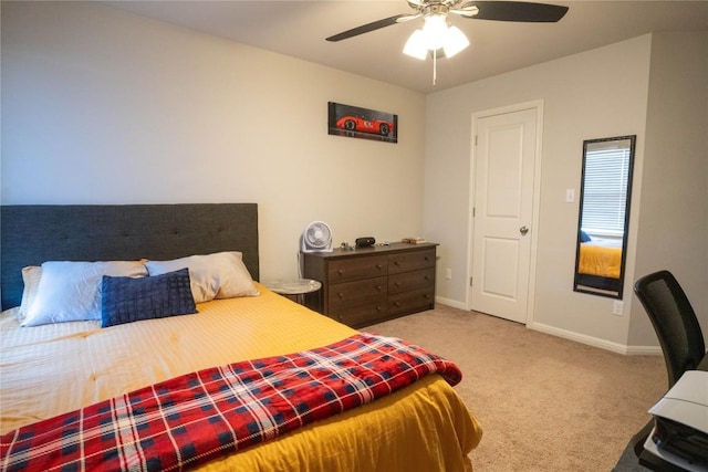 bedroom with light carpet and ceiling fan