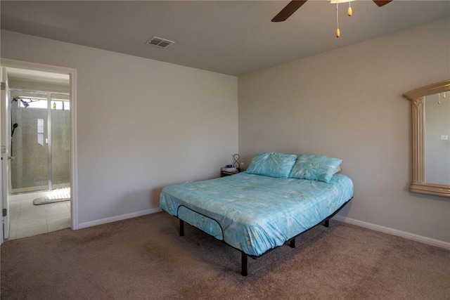 bedroom featuring connected bathroom, ceiling fan, and carpet flooring