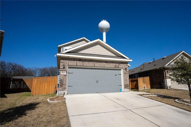 view of front of property featuring a garage