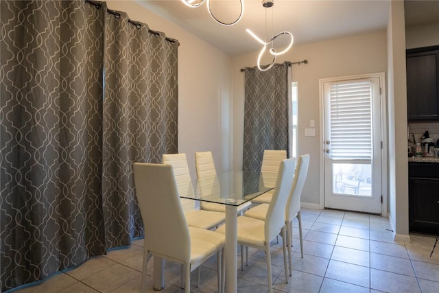 dining room featuring light tile patterned floors