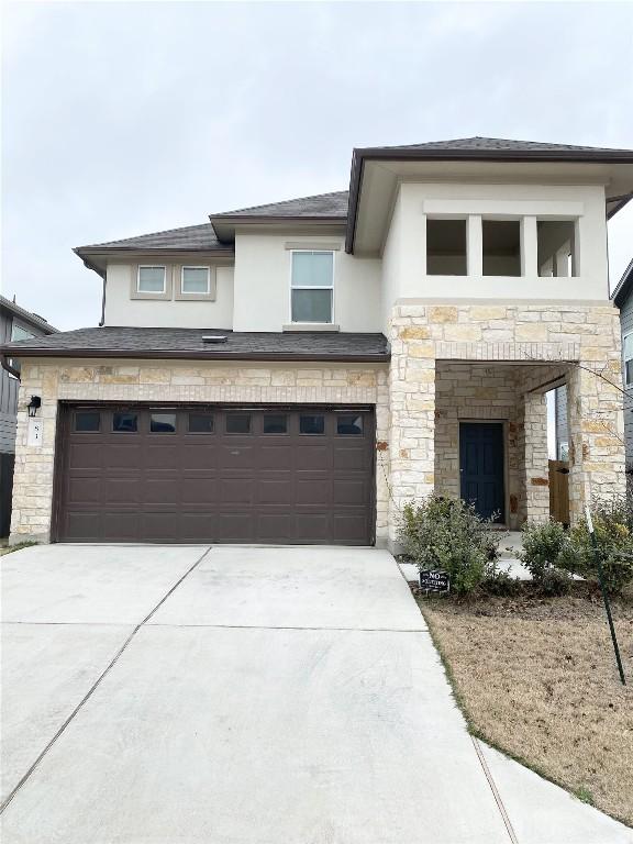 view of front of house with a garage