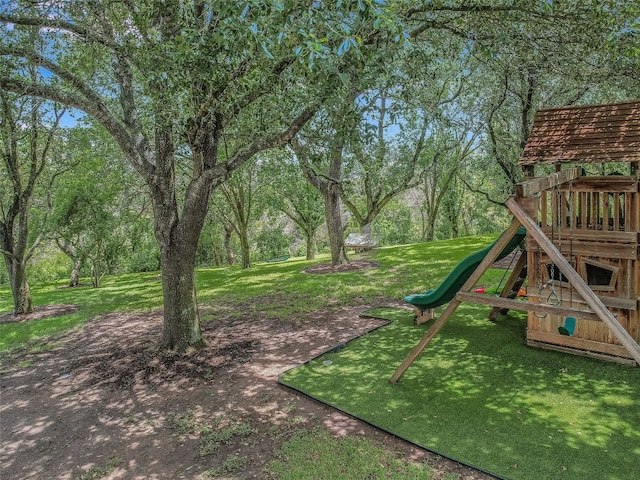 417 Beardsley Ln, Austin, TX 78746 - view of green lawn featuring a playground